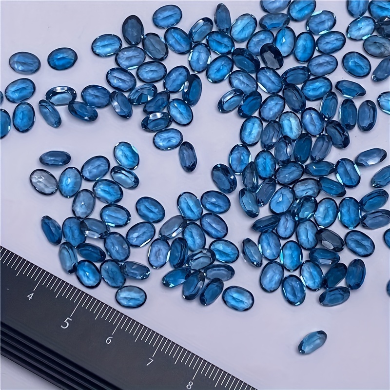 1 على شكل توباز بيضاوي أزرق طب - مراجعة Jewelry Making London وسعره
